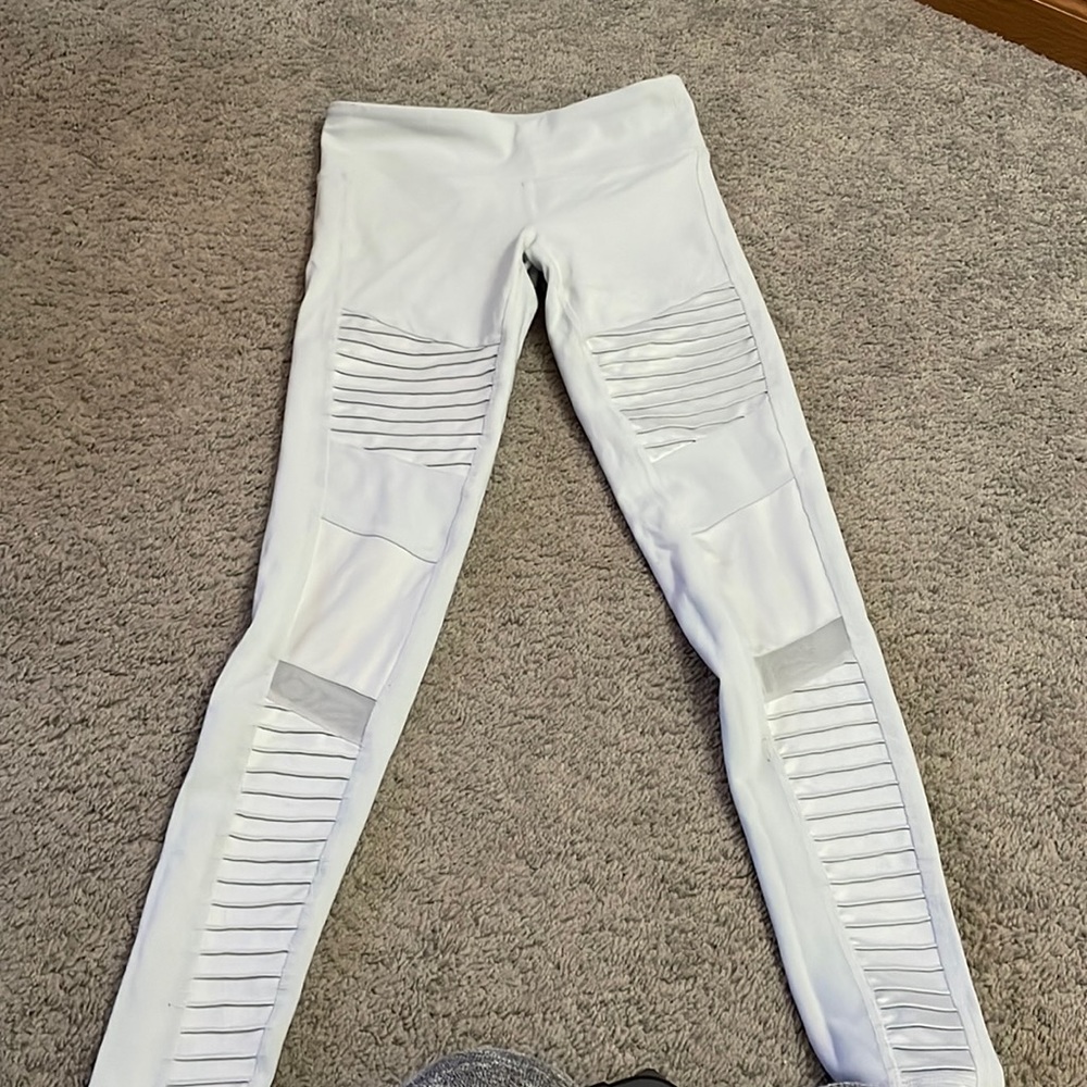 Alo moto leggings in a very light grey.